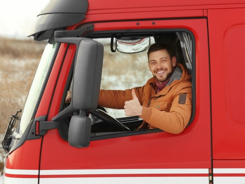 truck driver in red truck